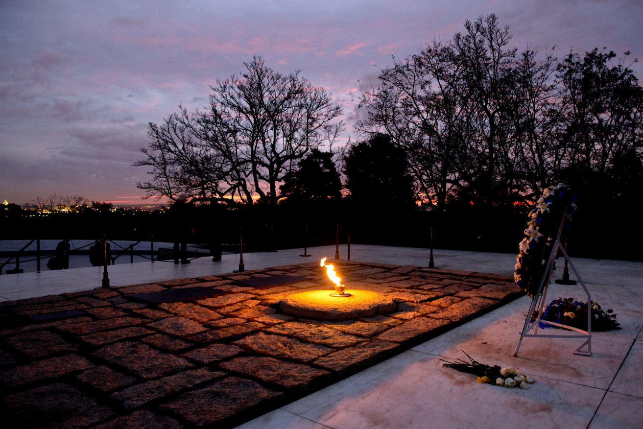 The eternal flame flickers in the early morning light at the grave of John F Kennedy at Arlington National Cemetery on  November 22, 2013 - the 50th anniversary of Kennedy's death. Photo: AP/Jacquelyn Martin