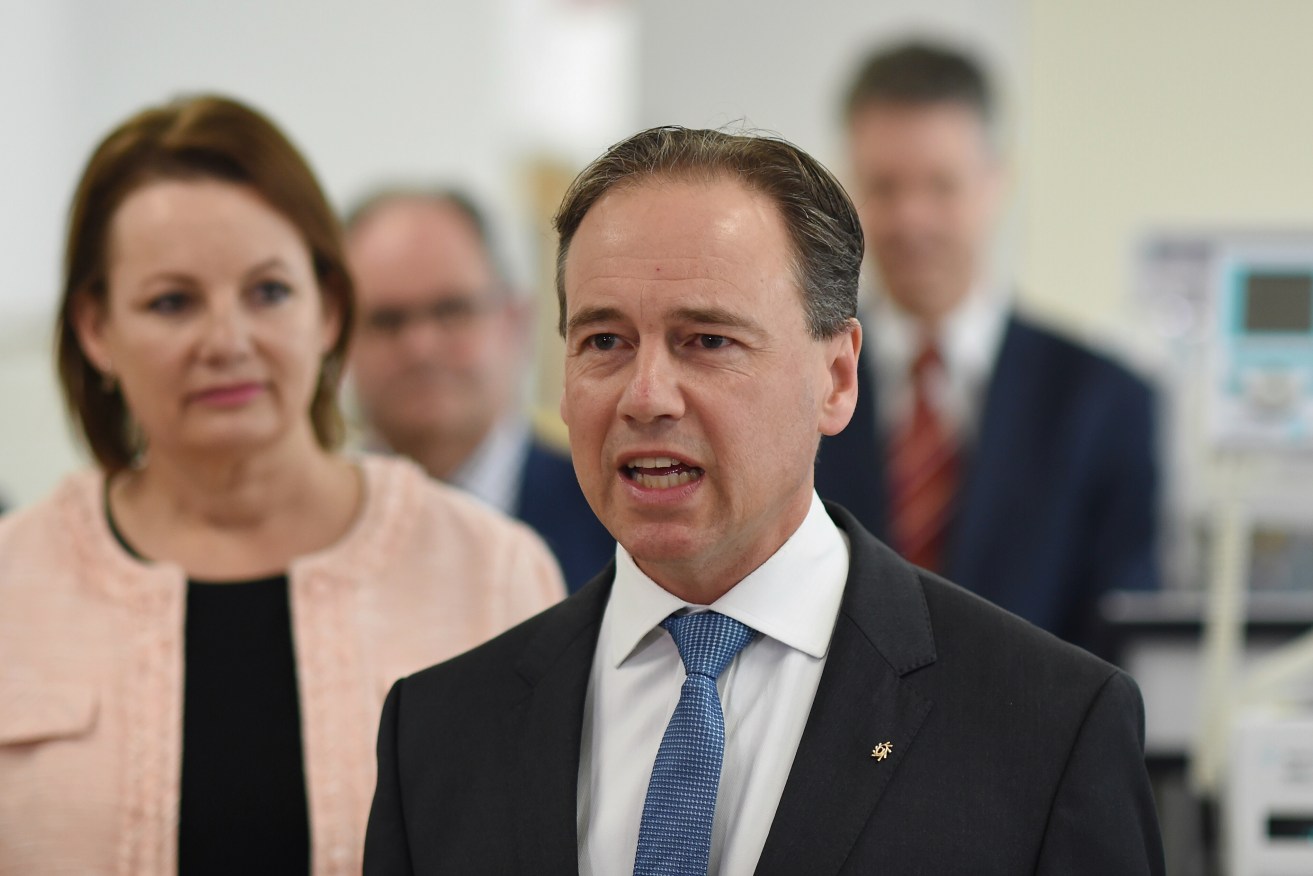 A file image of new health minister Greg Hunt with predecessor Sussan Ley. Photo: AAP/Lukas Coch