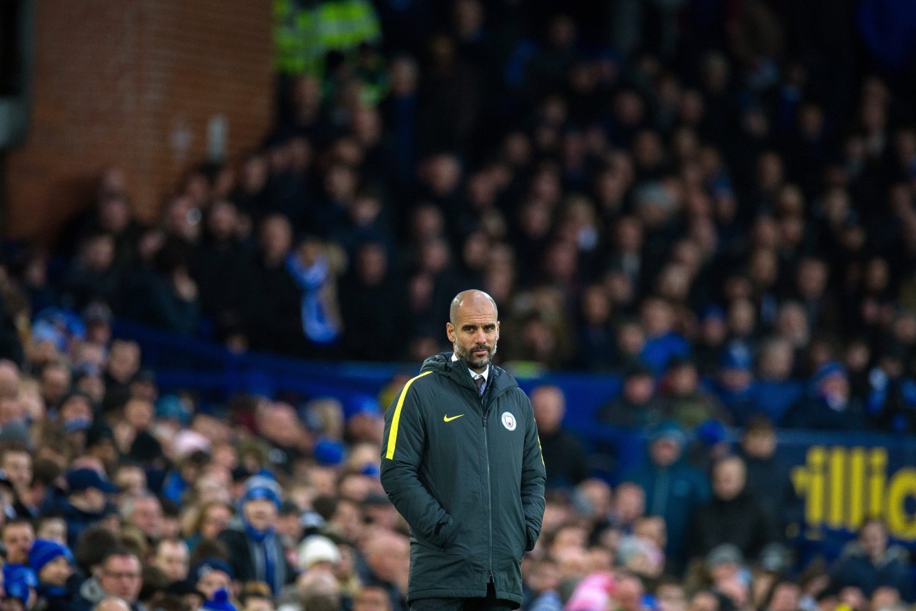 Manchester City's manager Pep Guardiola reacts during the heavy loss to Everton FC. Photo: Peter Powell / EPA