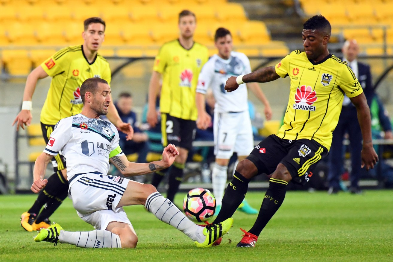 Carl Valeri of the Victory (left) contests the ball with Rolieny Bonevacia of the Phoenix during their rescheduled Round 7 A-League match. Photo: Ross Setford / SNPA via AAP