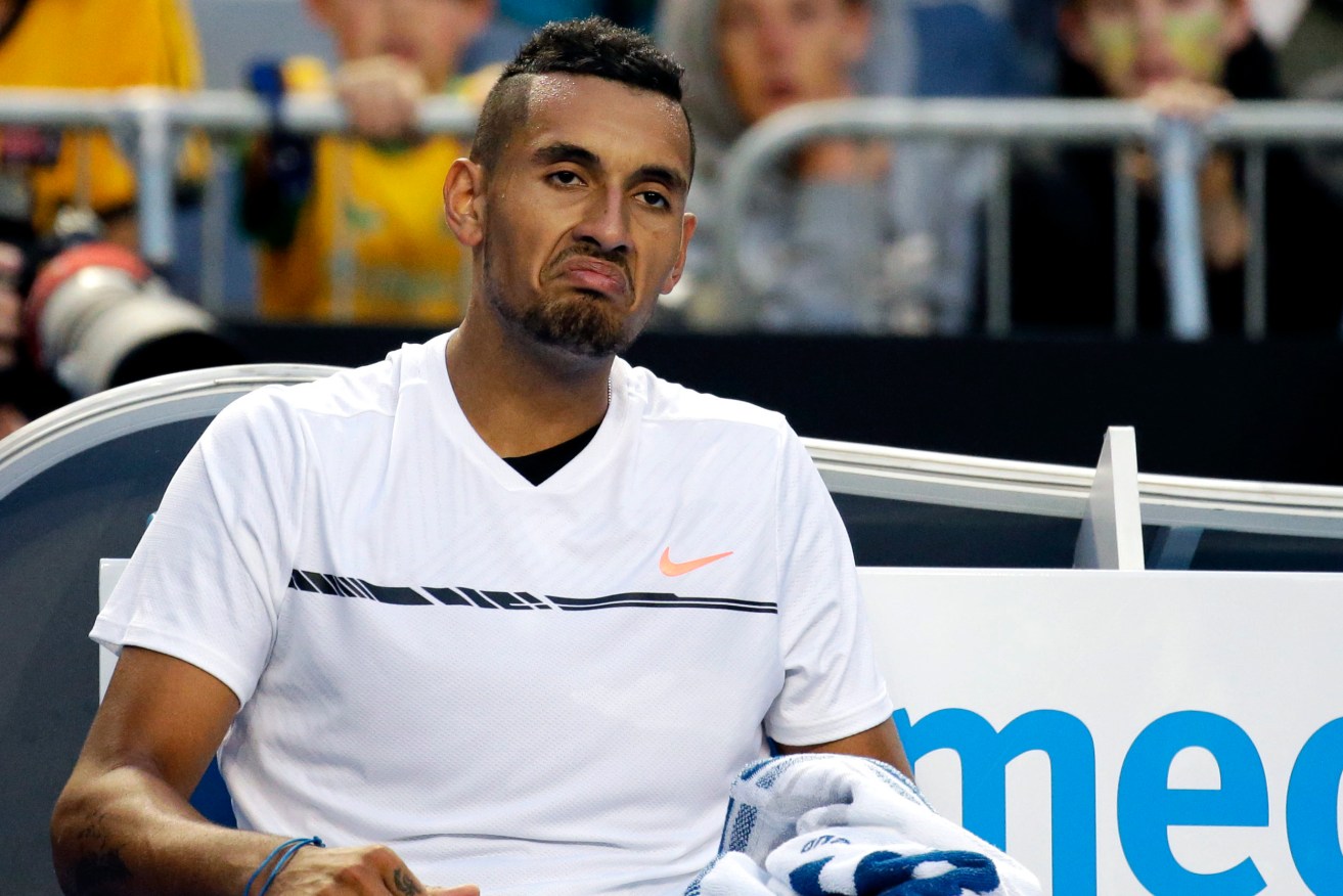 Nick Kyrgios assesses the situation during his second round defeat to Italy's Andreas Seppi. Photo: Aaron Favila / AP