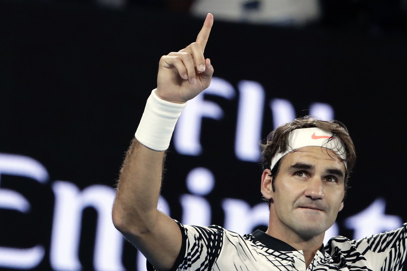 Roger Federer of Switzerland reacts after defeating Stanislas Wawrinka of Switzerland at the end of their Men's Singles semifinal match at the Australian Open Grand Slam tennis tournament in Melbourne, Victoria, Australia, 26 January 2017. (AAP Image/Mark Cristino) NO ARCHIVING, EDITORIAL USE ONLY