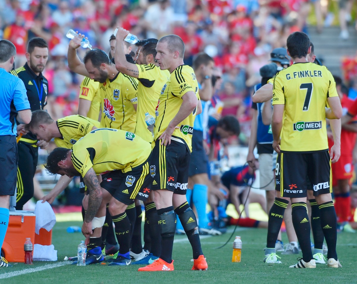 Phoenix players stop to drink during the round 17 A-League match between the Adelaide United and Wellington Phoenix at Coopers Stadium in Adelaide, Sunday, Jan. 29, 2017. (AAP Image/David Mariuz) NO ARCHIVING, EDITORIAL USE ONLY