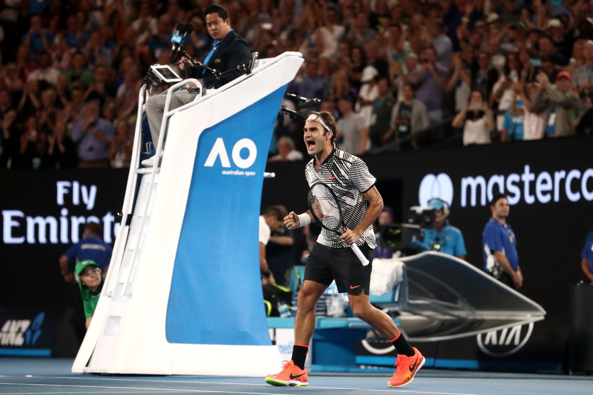 Roger Federer of Switzerland celebrates winning championship point in his Men's Final match against Rafael Nadal of Spain on day 14 of the 2017 Australian Open at Melbourne Park on January 29, 2017 in Melbourne, Australia. (AAP Image/Pool/Getty Images/Scott Barbour) NO ARCHIVING, EDITORIAL USE ONLY *** Local Caption *** Roger Federer
