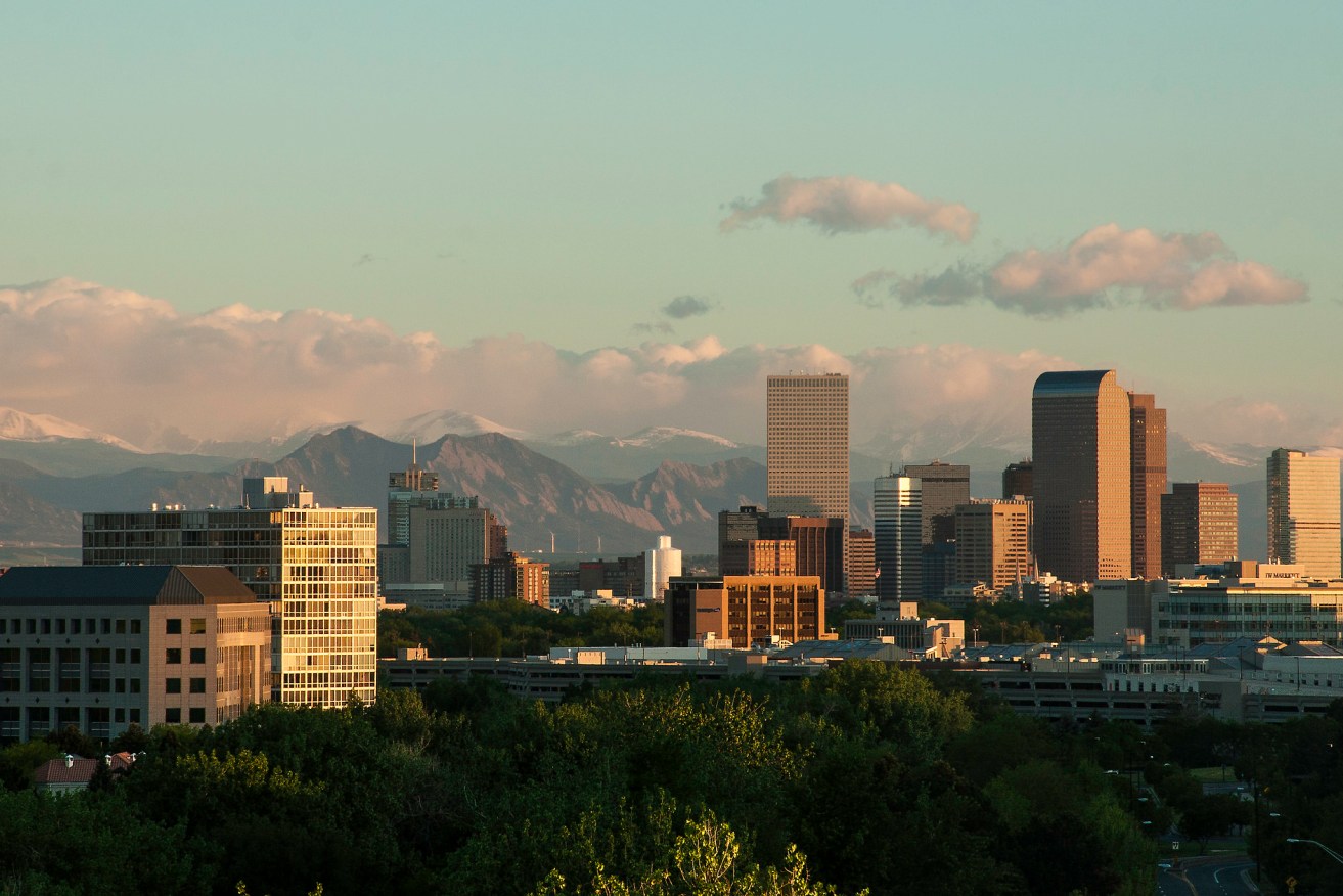 The sun rises over Denver, Colorado. Photo: Sheila Sund/Flickr - https://creativecommons.org/licenses/by/2.0/