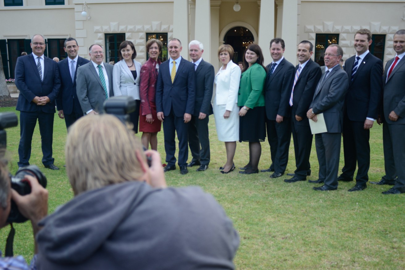 Ian Hunter (third from left) and Zoe Bettison (nine from left) have been the subject of internal rumours of a reshuffle - but the Premier has ruled out changing his ministry. Photo: Nat Rogers / InDaily