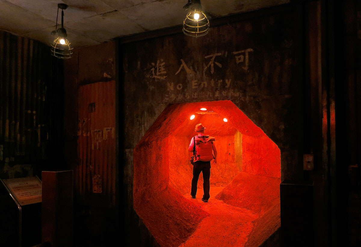 A red hallway leads to the reconstructed Kowloon Walled City. Photo: Ken Ohyama / Wikimedia Commons