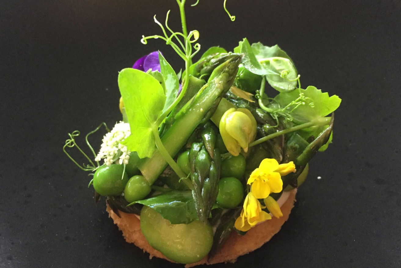 The Chef's Table will include dishes such as this spring vegetable tart with brassica flowers.
