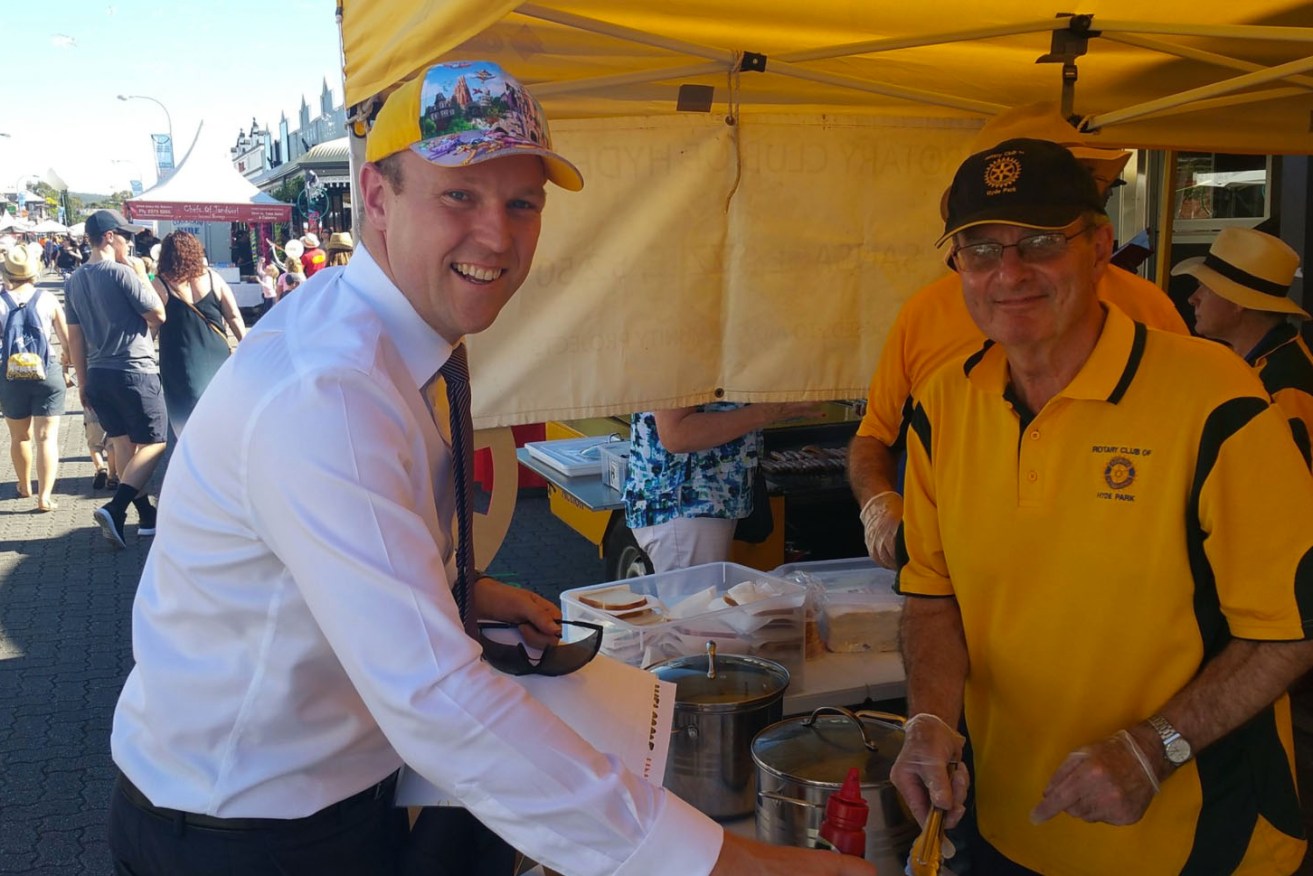 Unley Mayor Lachlan Clyne at a Tour Down Under sausage sizzle - but have his designs on Badcoe hit a snag? Photo: Twitter
