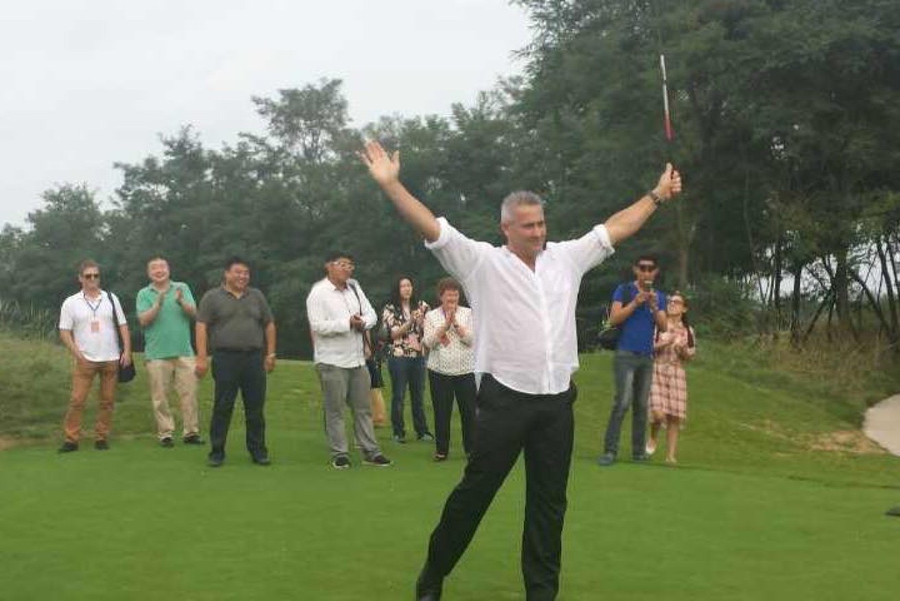 Mark Dowd celebrating a golf shot during a personal holiday. Photo: Facebook