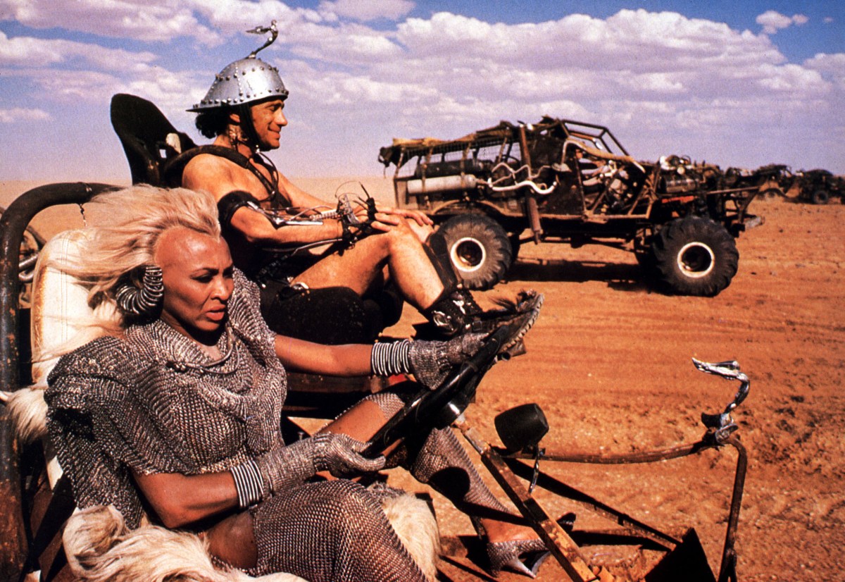 "Bigfoot" in the background of this still shot from Mad Max: Beyond Thunderdome (1985). Picture from the Ronald Grant Archive 