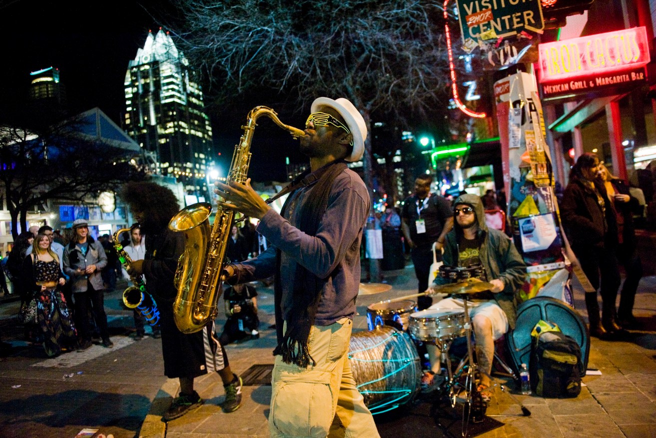 Musicians perform on Sixth Street during the South by Southwest festival in Austin, Texas. Photo: EPA/Ashley Landis