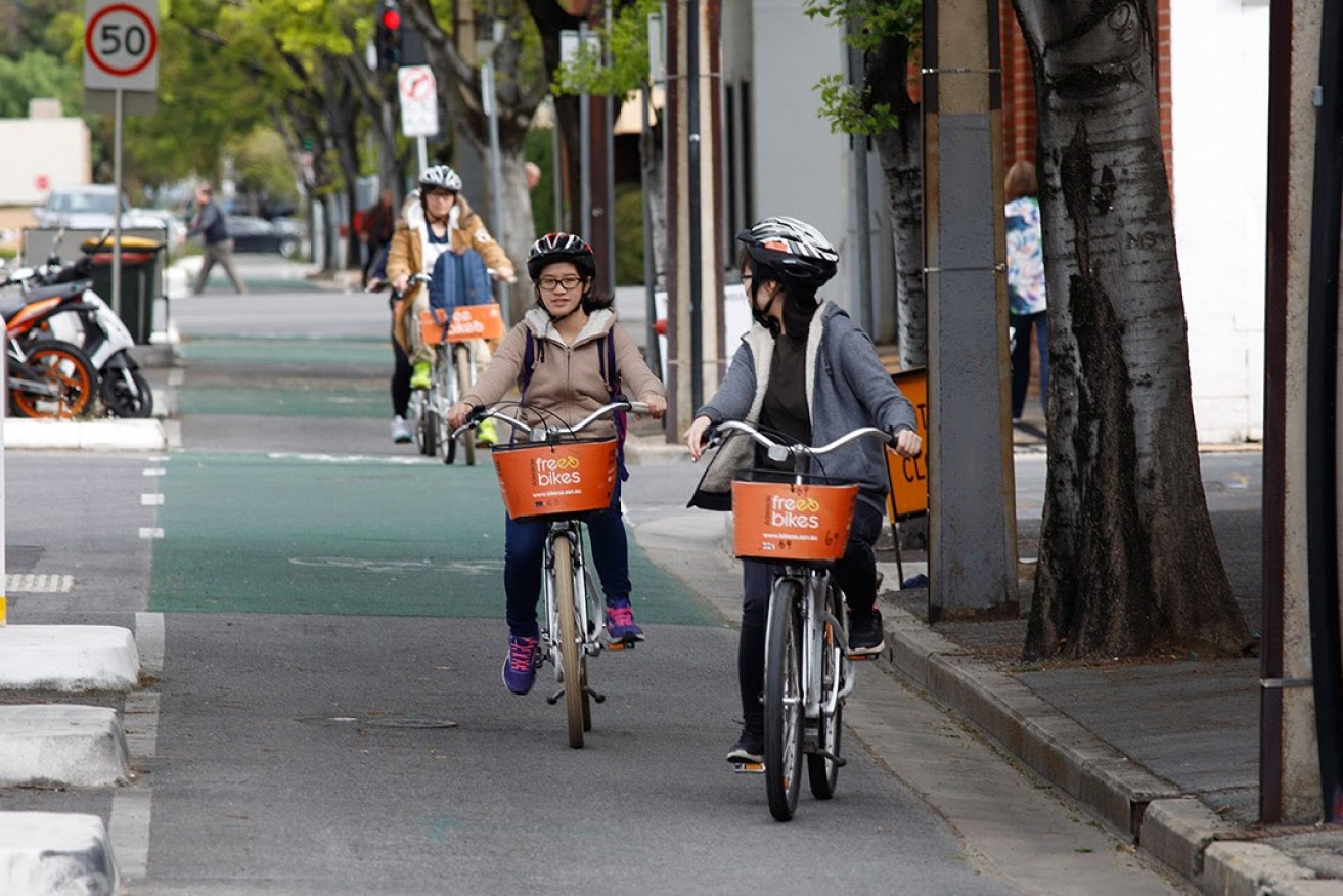 Cyclists using Adelaide Free Bikes bicycles on Frome Street in 2016. Photo: Tony Lewis/InDaily