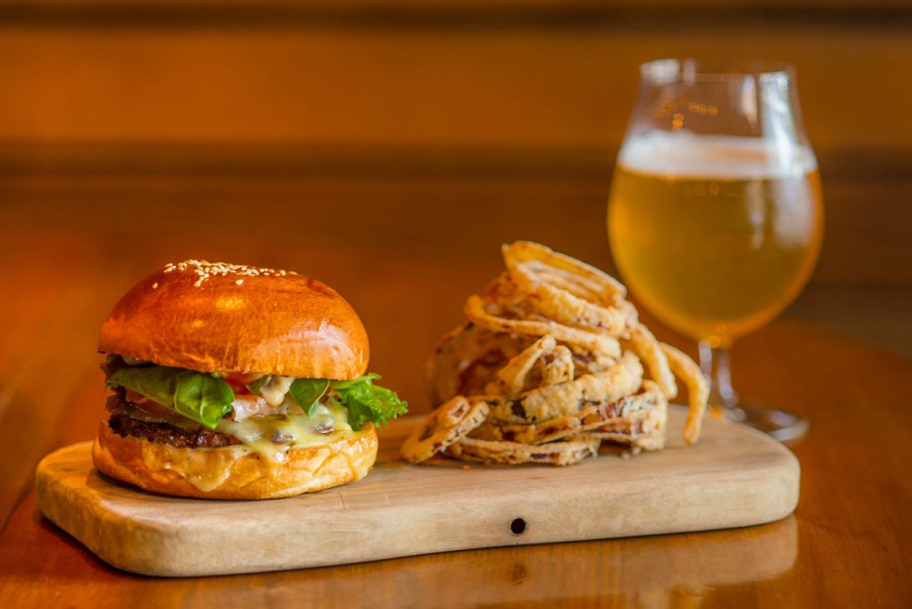 The Press Food & Wine burger and onion rings matches well with the malty sweetness of a Knappstein Reserve Lager. Photos: John Krüger