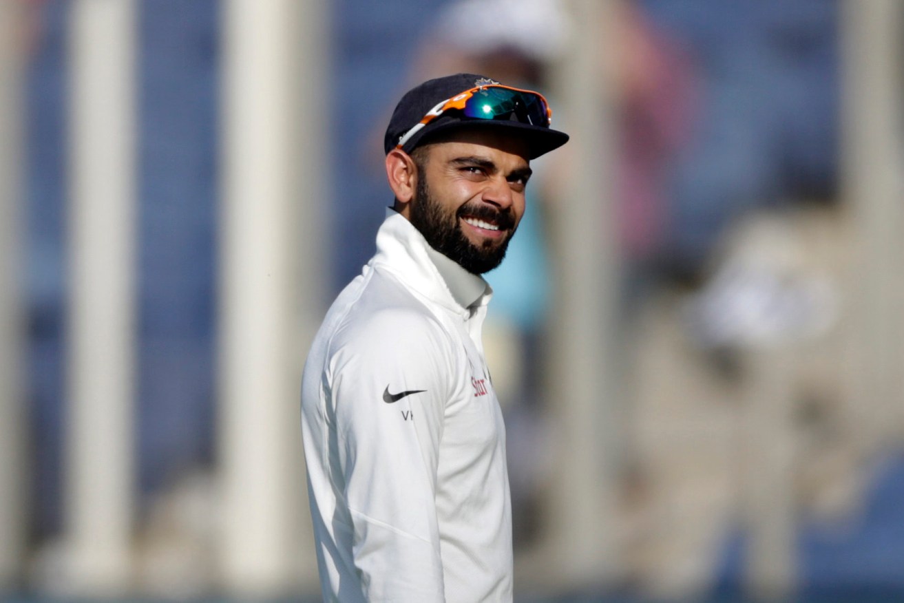 Indian captain Virat Kohli during the first Test cricket in Pune. Photo: Rajanish Kakade / AP