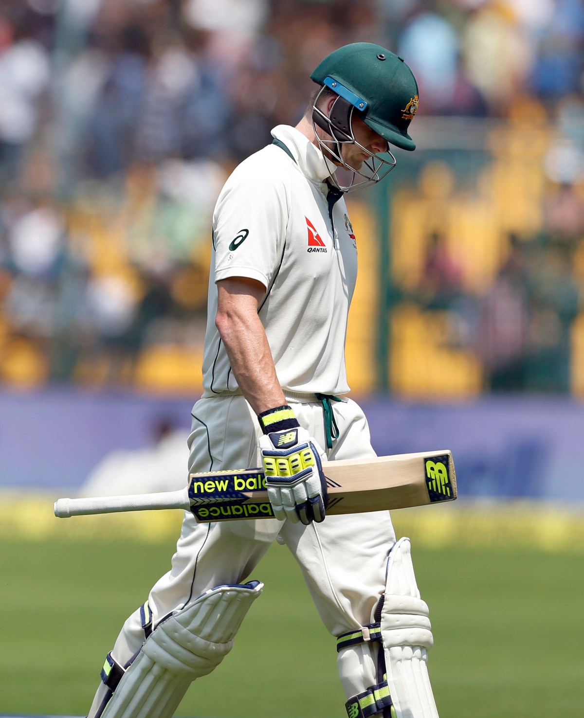 Australia's captain Steven Smith leaves the field after being dismissed during the fourth day of their second test cricket match against India in Bangalore, India, Tuesday, March 7, 2017. (AP Photo/Aijaz Rahi)