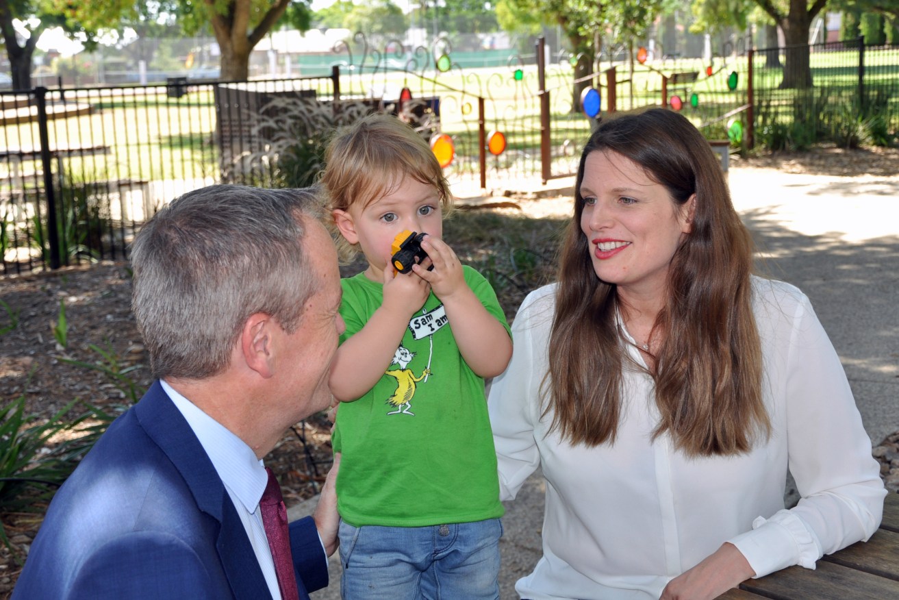 Kate Ellis, with her son Samuel and Opposition Leader Bill Shorten, after fronting media over her resignation last week. Photo: Tim Dornin / AAP