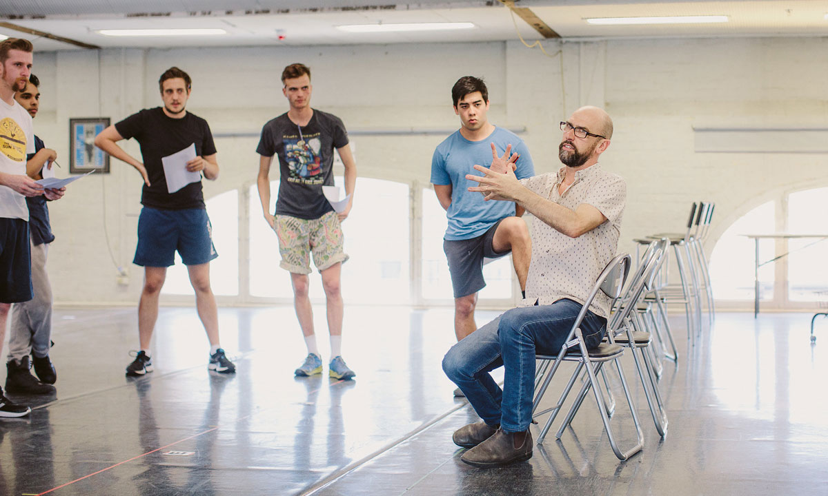 Chris Drummond (far right) and cast members in rehearsals for Long Tan. Photo: Kate Pardey