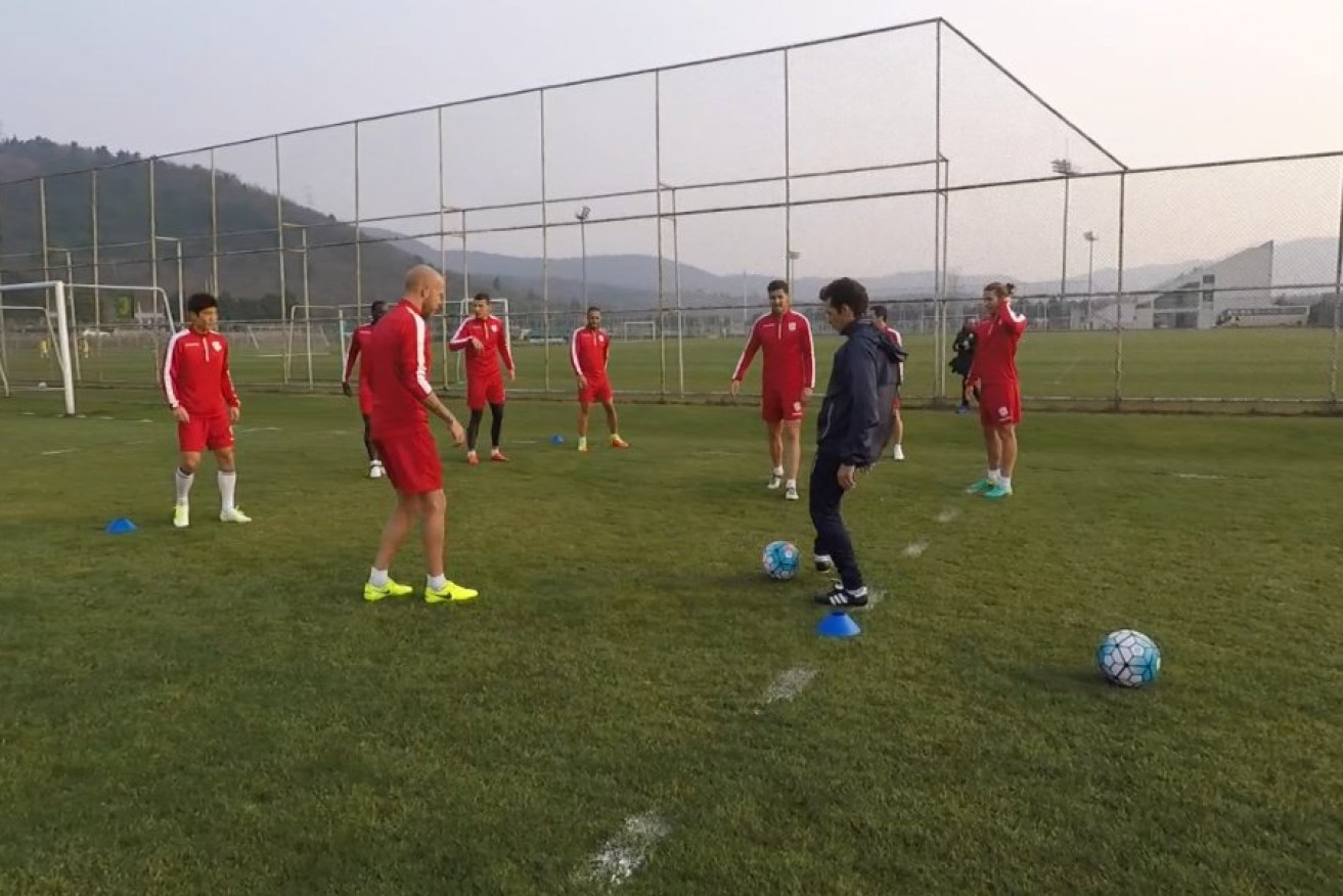 Amor oversees training in China. Photo: Twitter
