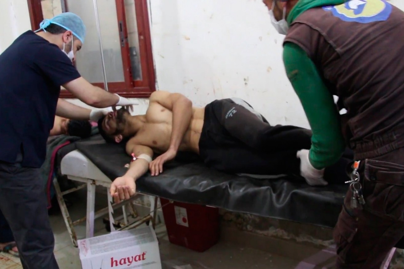 Syrian people receiving treatment after an alleged chemical attack in Saraqib, Idlib province, northern Syria. Photo: EPA/Stringer