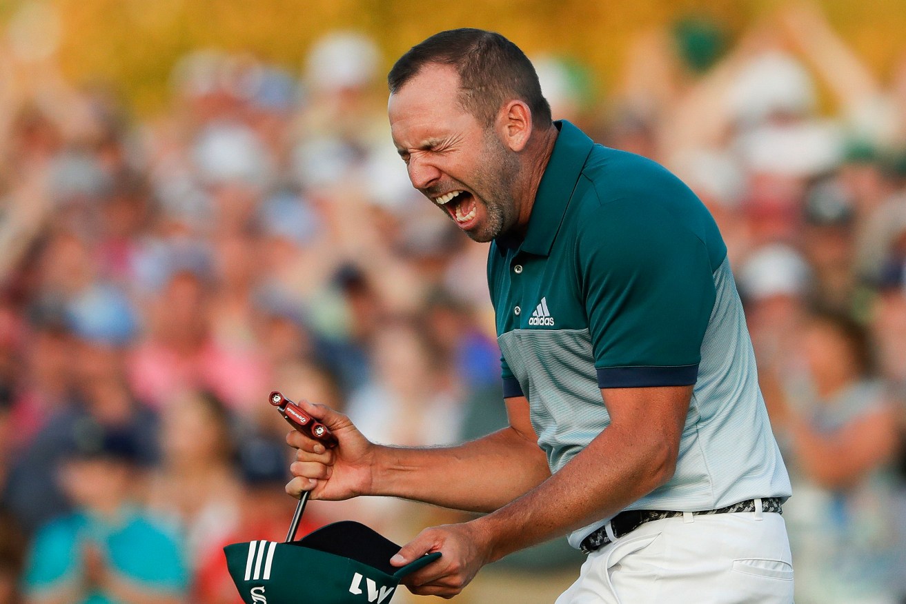 Spaniard Sergio Garcia reacts after making his birdie putt on the 18th green to win the Masters golf tournament. Photo: Matt Slocum / AP