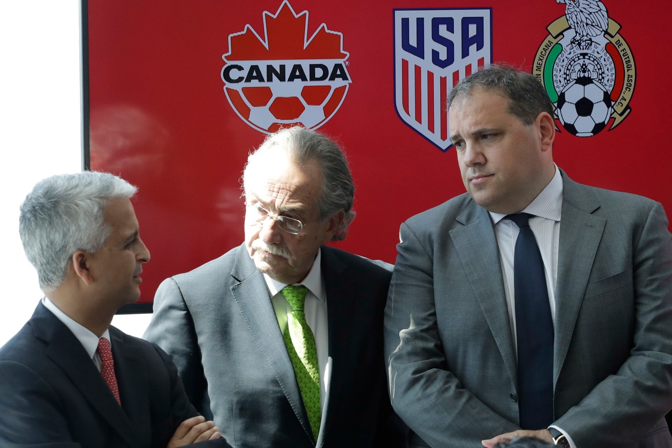 Sunil Gulati, Decio de Maria, and Victor Montagliani announce a bid to co-host the 2026 World Cup. Photo: Mark Lennihan / AP