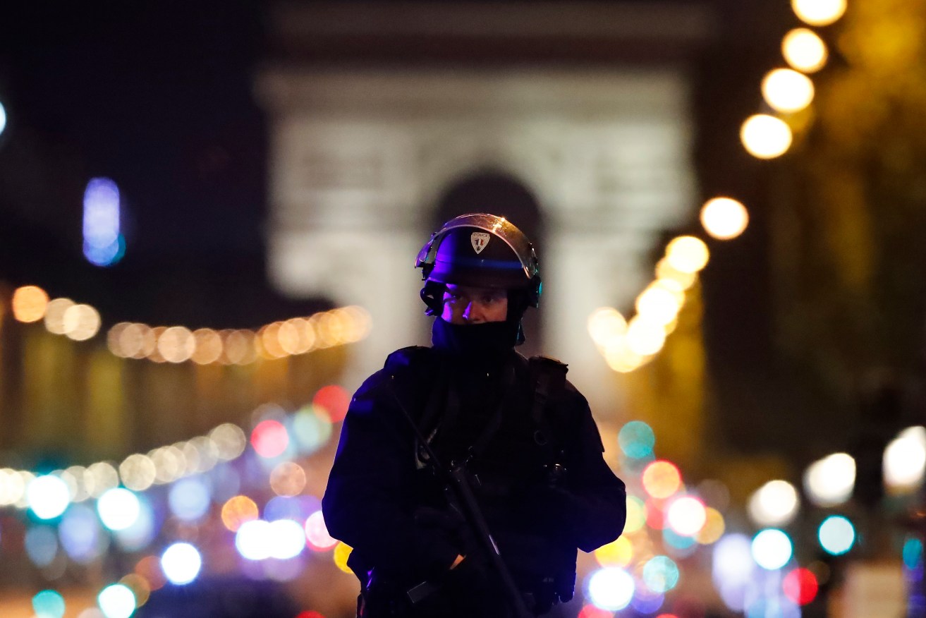 French Police show force  on the Champs Elysees in Paris after the shooting.
Photo: EPA/Ian Langsdon