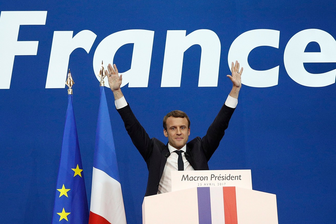French presidential election candidate Emmanuel Macron celebrates after the first round of the French presidential elections. Photo: EPA/Yoan Valat
