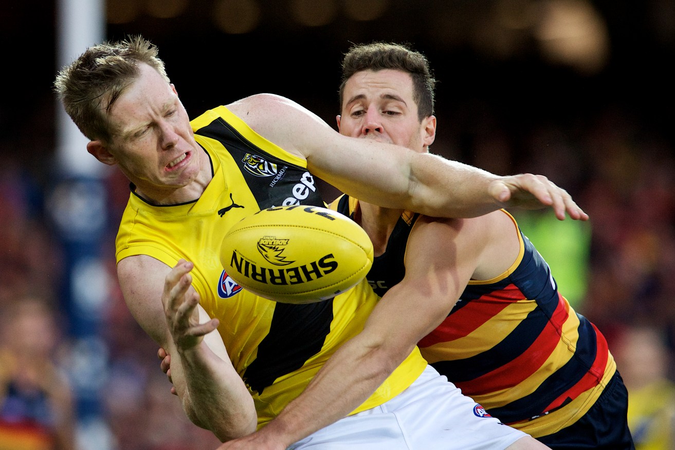 Jack Riewoldt is spoiled in a marking attempt as the Crows take control. Photo: Michael Errey / InDaily