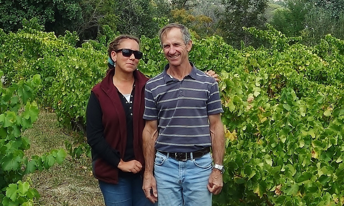 Rae and Drew Noon in their old Grenache vineyard on the Willunga Escarpment piedmont. Photo: Philip White