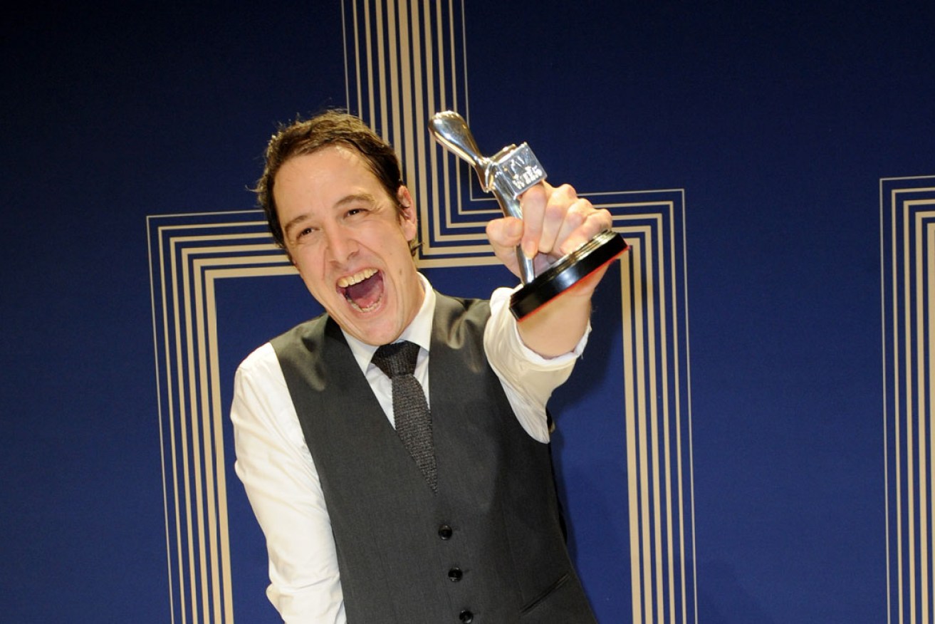 Samuel Johnson with the silver Logie he won for best actor. Photo: AAP