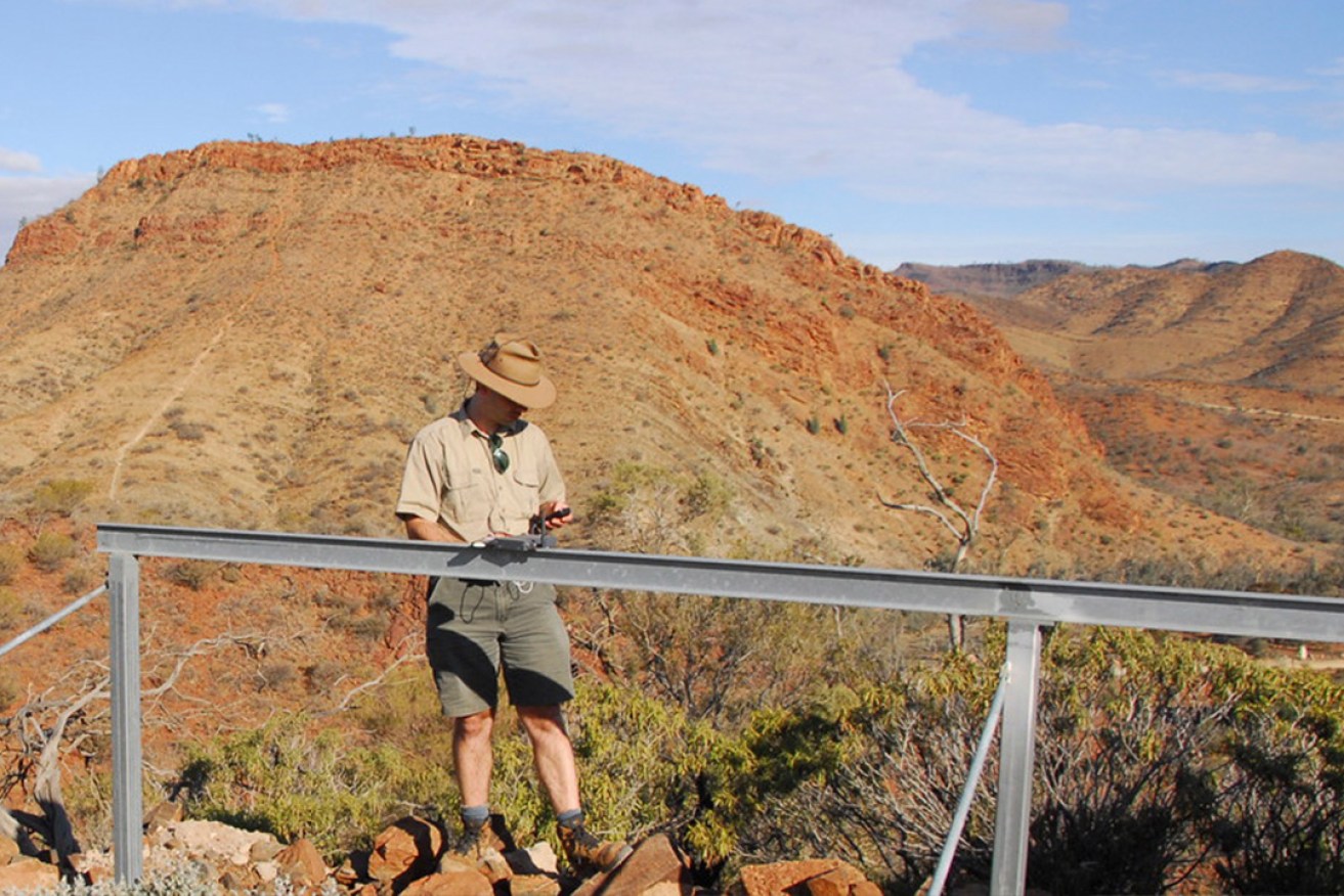 Dr Paul Gardner-Stephen testing a prototype Mesh Extender device in Arkaroola, in Outback South Australia. Dr Paul Gardner-Stephen, Author provided
