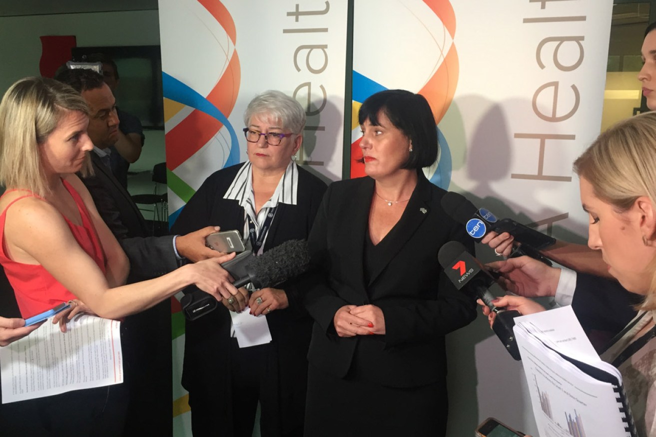 Then-Mental Health Minister Leesa Vlahos (centre-right) next to SA Health CEO Vicki Kaminski, answering journalists' questions following the release of the Oakden Report.