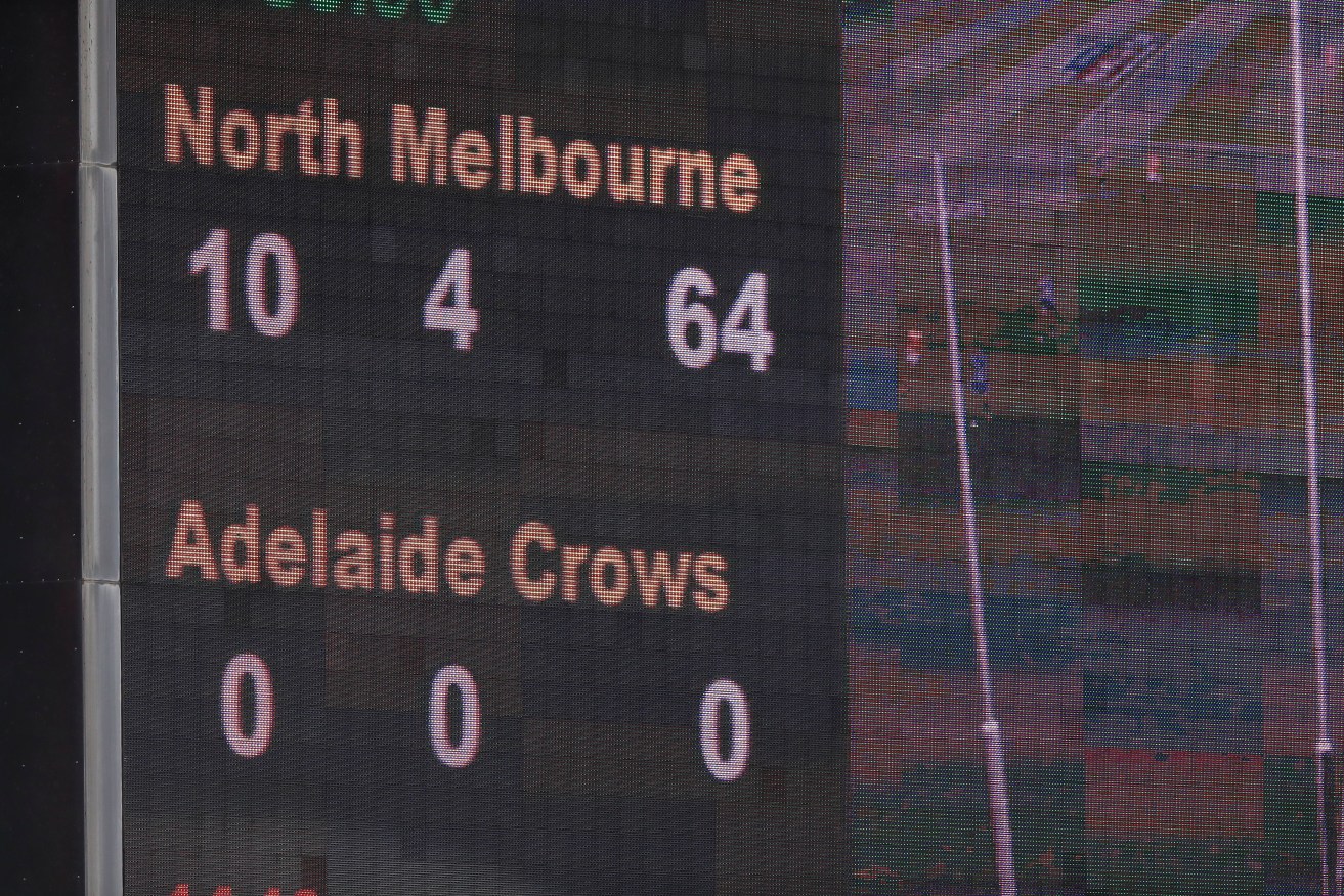 NORMAL SERVICE HAS BEEN RESUMED: Quarter time at Bellerive. Unfortunately, the scoreboard is working perfectly... unlike the Crows. Photo: Rob Blakers / AAP