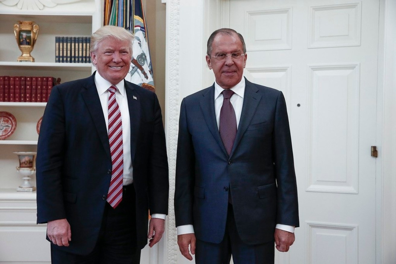 US President Donald J. Trump (left) with Russian Foreign Minister Sergei Lavrov during a meeting in the White House. Photo: EPA/Russian Foreign Ministry