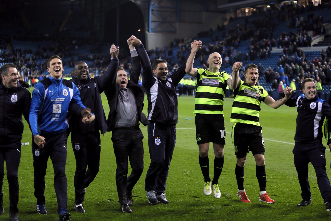 Aaron Mooy joins Huddersfield Town manager David Wagner, chairman Dean Hoyle and teammates to celebrate victory over Sheffield Wednesday earlier this month, setting up their playoff against Reading at Wembley tonight. 