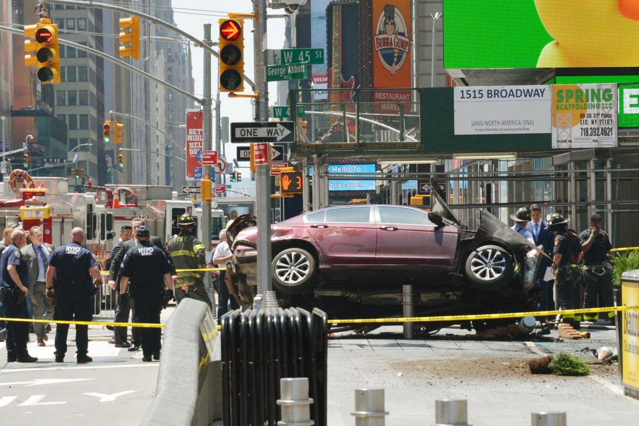 A car is pictured after crashing into a crowd of pedestrians in New York's Times Square. Photo: AP