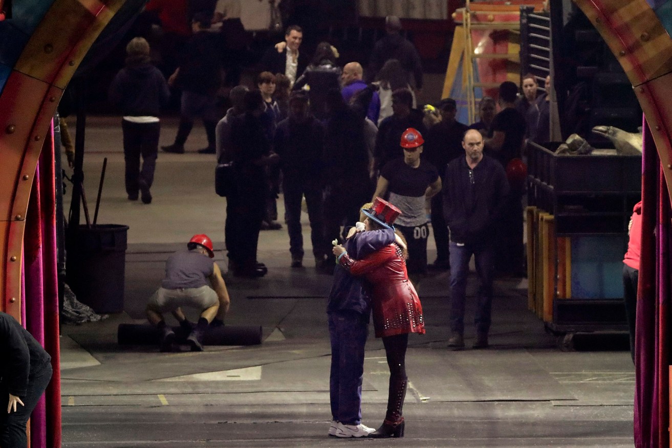 Ringling Bros and Barnum & Bailey Circus ringmaster Kristen Michelle Wilson hugs a member of the crew after the circus' red unit gave its final performance in Providence, Rhode Island. Photo: AP/Julie Jacobson