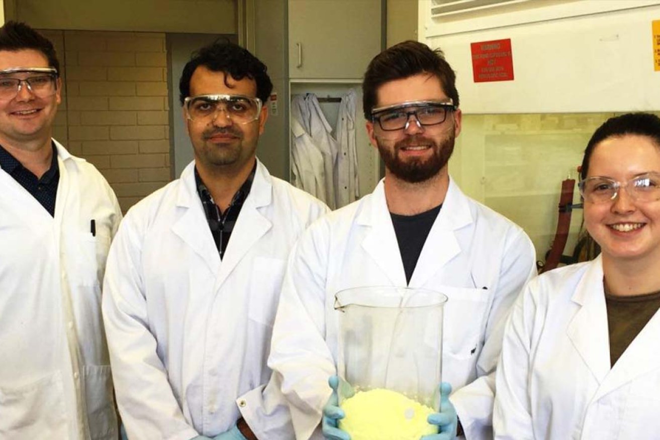 Flinders Lecturer in Synthetic Chemistry Dr Justin Chalker, left, with postgraduate students Salah Alboaiji, Max Worthington (with sulfur material) and Renata Kucera.