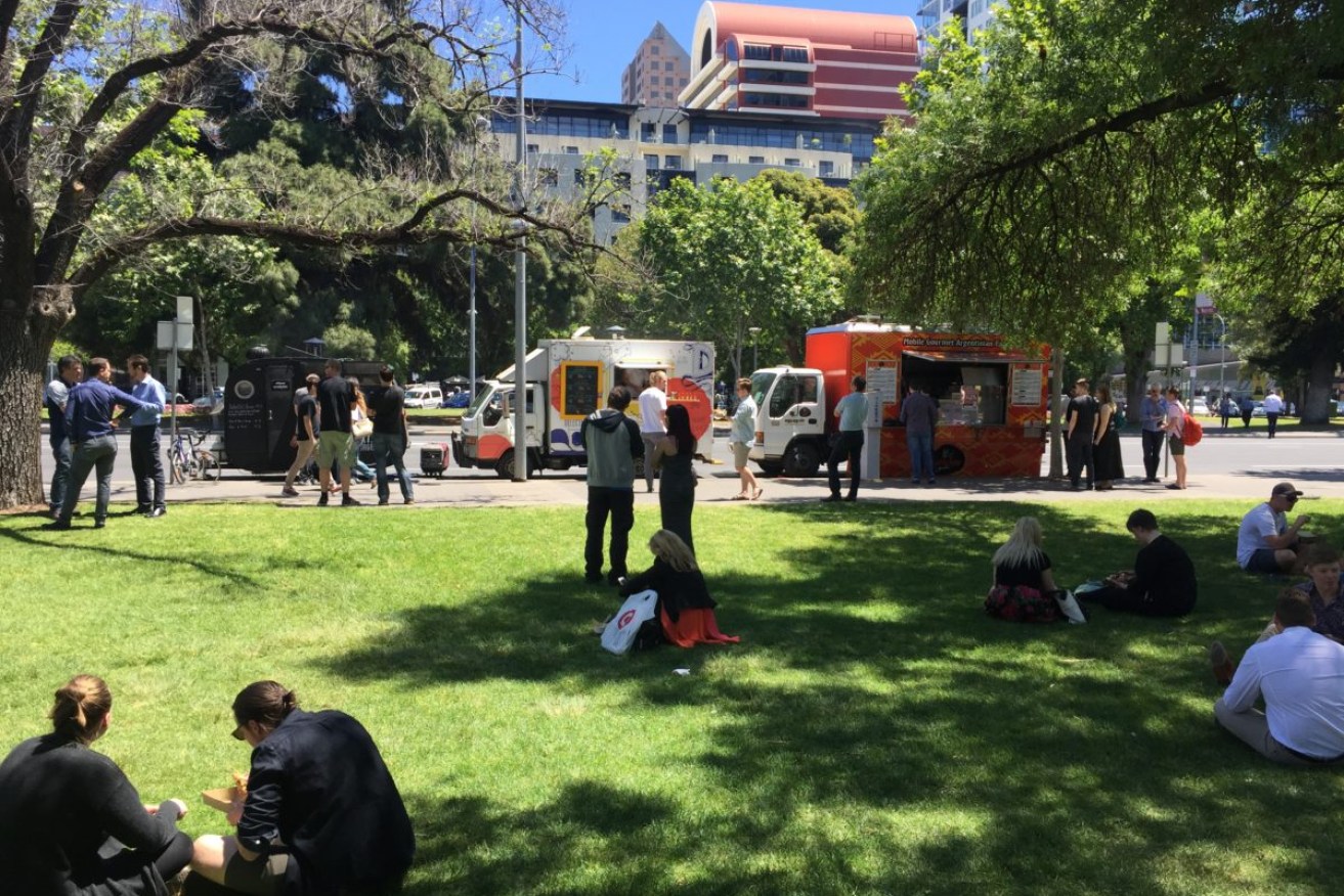 Food trucks serving customers in Hindmarch Square. Photo: Bension Siebert