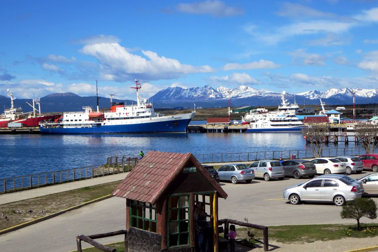 The tourist pier at Ushuaia, Argentina, with the snowcapped mountains of Tierra del Fuego in the background. Photo: David Stanley / flickr