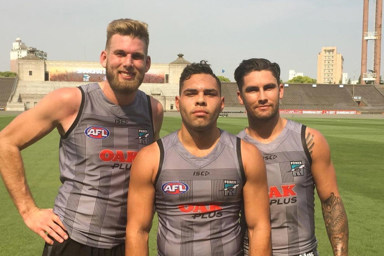 Port Adelaide's Jackson Trengove, Jarman Impey and Chad Wingard in Shanghai. Photo via Instagram