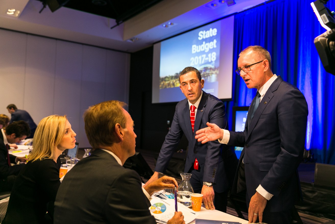 Tom Koutsantonis and Jay Weatherill discuss the budget's sex appeal with journalists. Photo: Andre Castellucci / InDaily