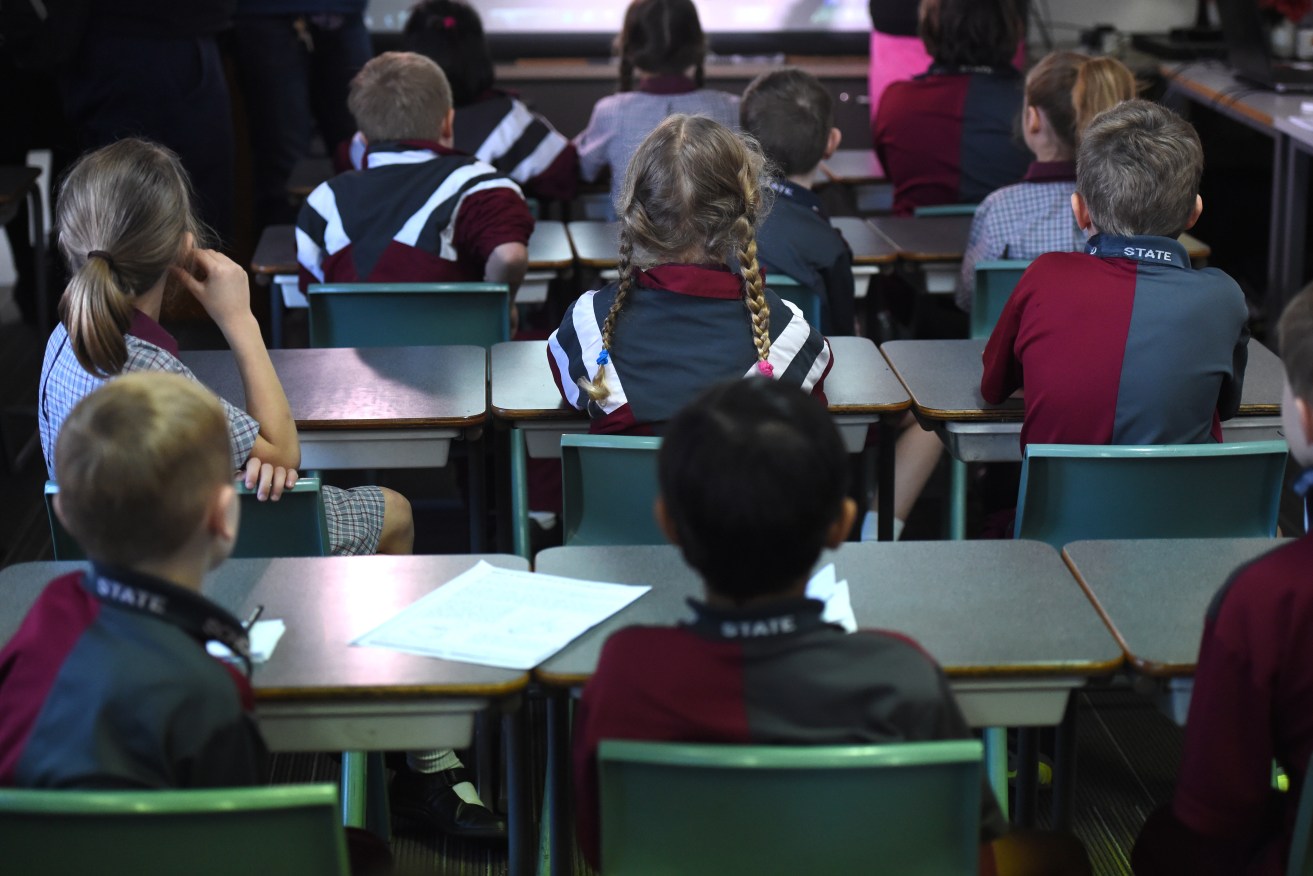 Children in most advantaged areas achieve on average double the score in reading, writing and numeracy tests. Photo: AAP/Dan Peled