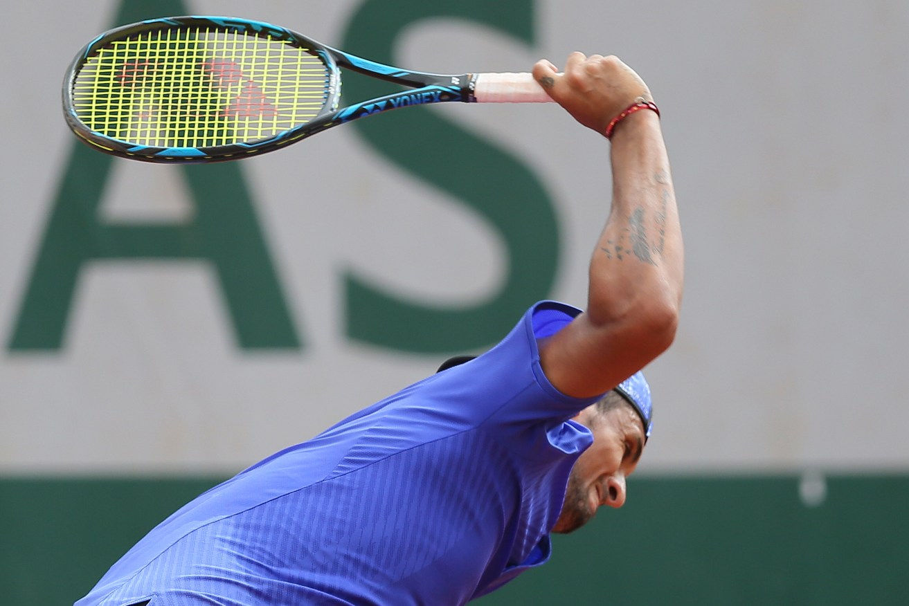 Australia's Nick Kyrgios vents his frustrations as he crashes out of the French Open. Photo: David Vincent / AP
