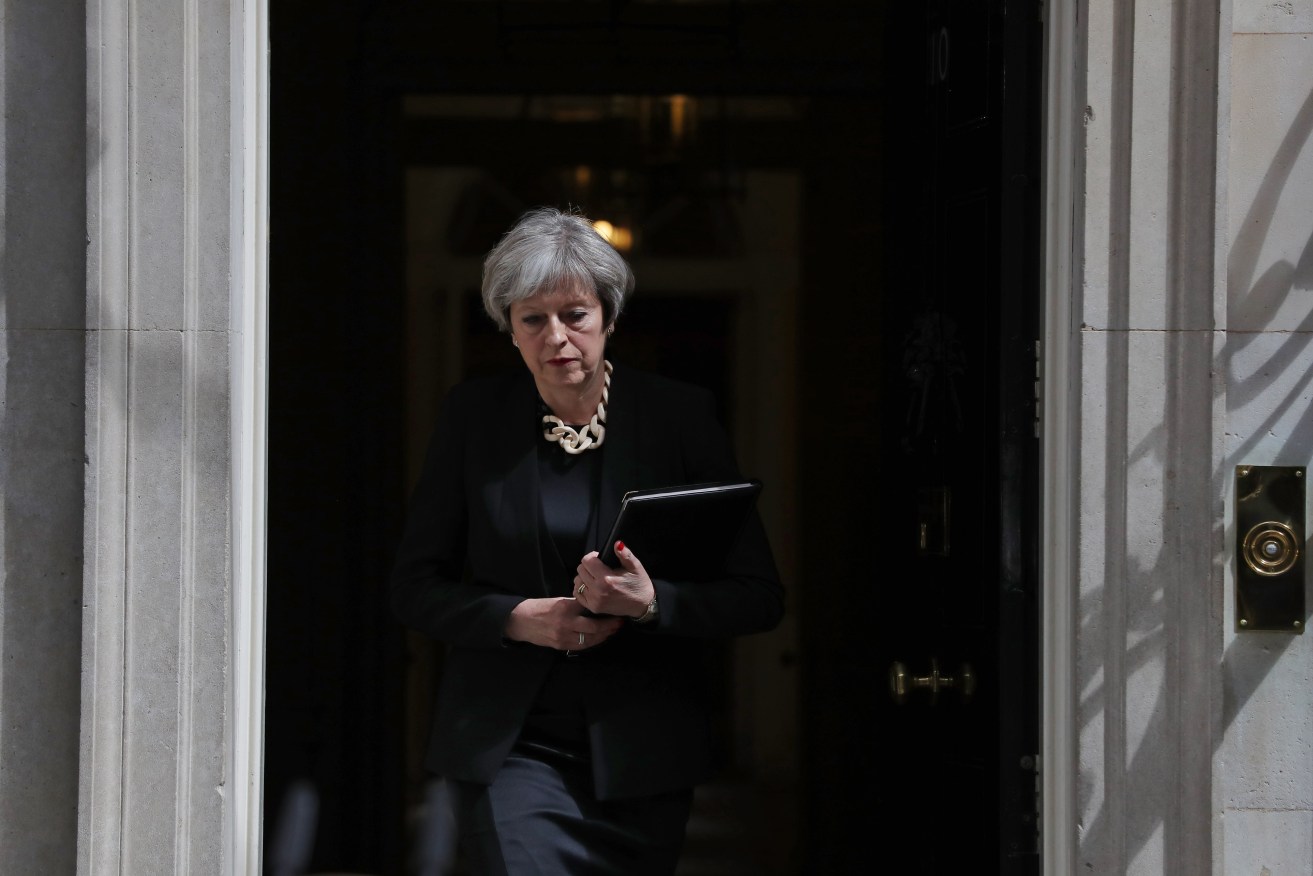 Prime Minister Theresa May prepares to make a statement after the most recent terrorist attack in London. Photo: Andrew Matthews/PA Wire