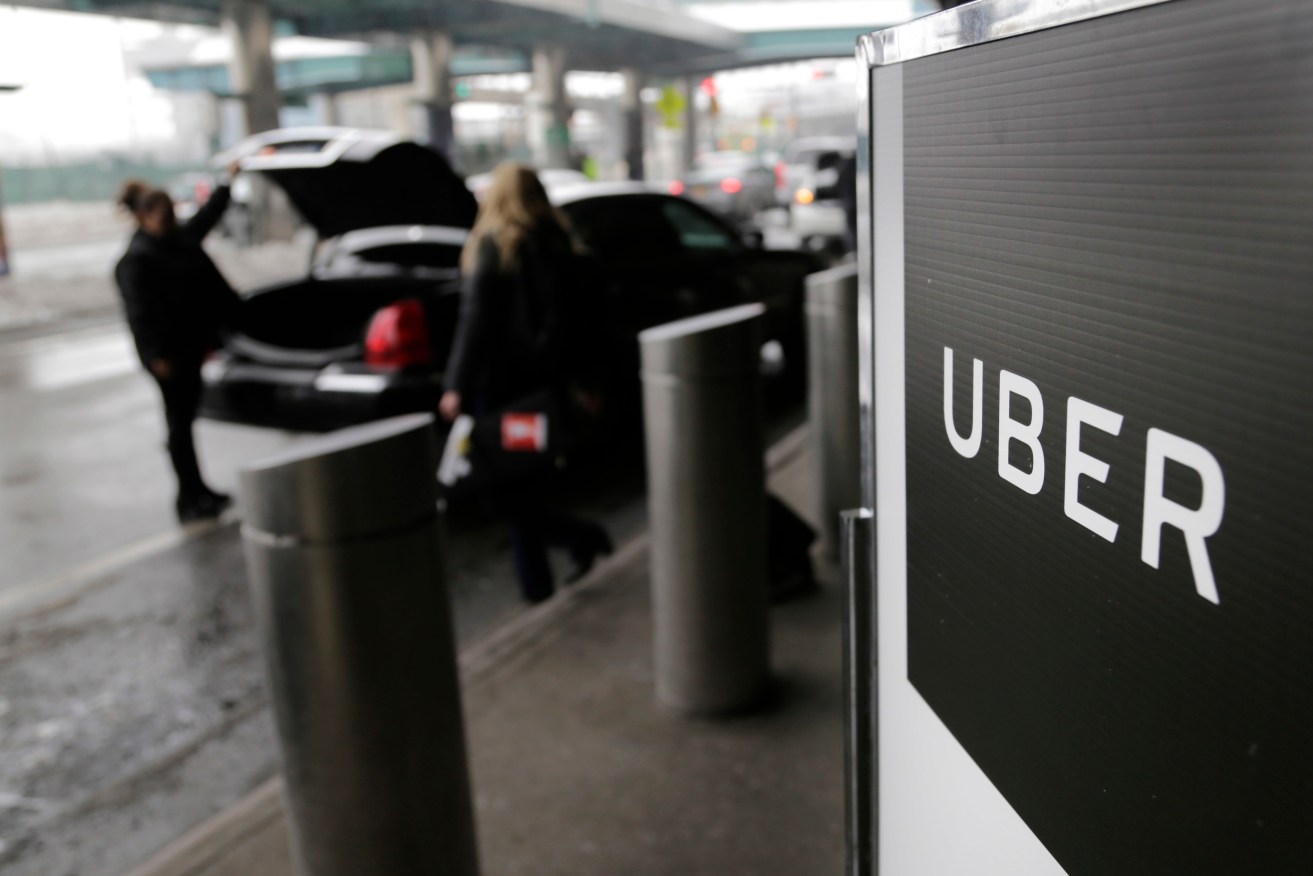 An Uber pick-up point at LaGuardia Airport in New York. Photo: Seth Wenig / AP