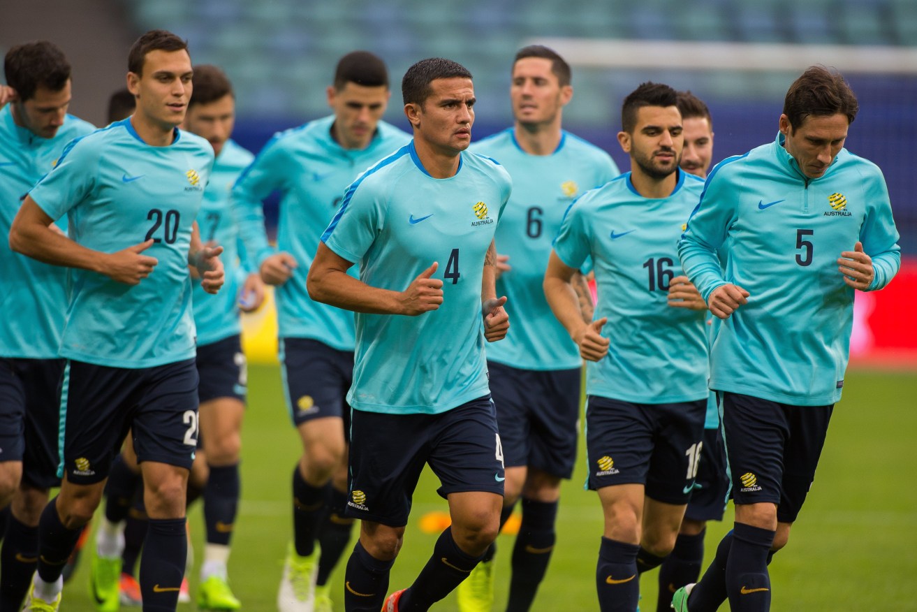 Tim Cahill leads his teammates during a training session ahead of tonight's Confederations Cup group match with Germany in Russia. Photo: PETER POWELL / EPA