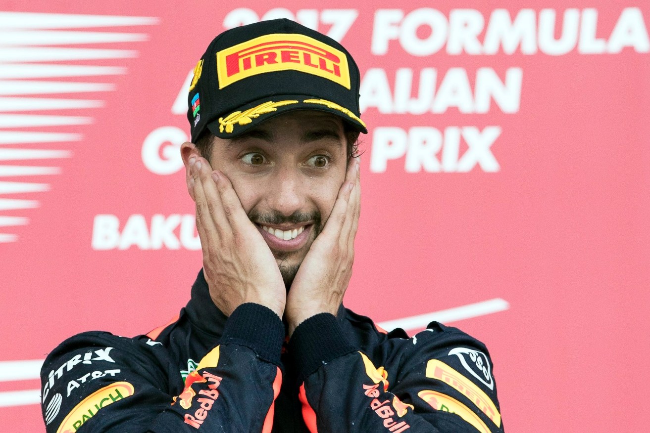 Daniel Ricciardo cant believe his luck after winning the Azerbaijan Grand Prix. Photo: VALDRIN XHEMAJ / EPA