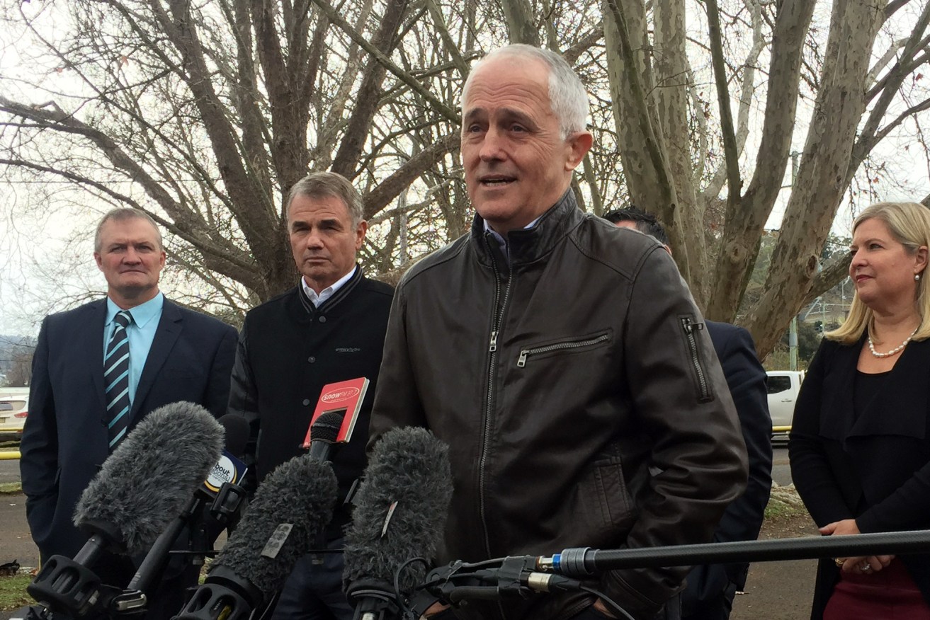 Prime Minister Malcolm Turnbull talks to the media during a Snowy Hydro 2.0 briefing in Cooma today. Photo: AAP/Jennifer Rajca